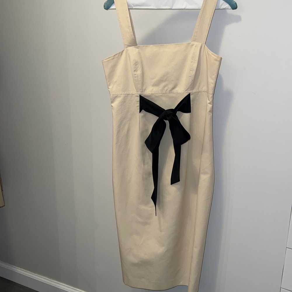Beige Mini Dress with Black Bow Accent
